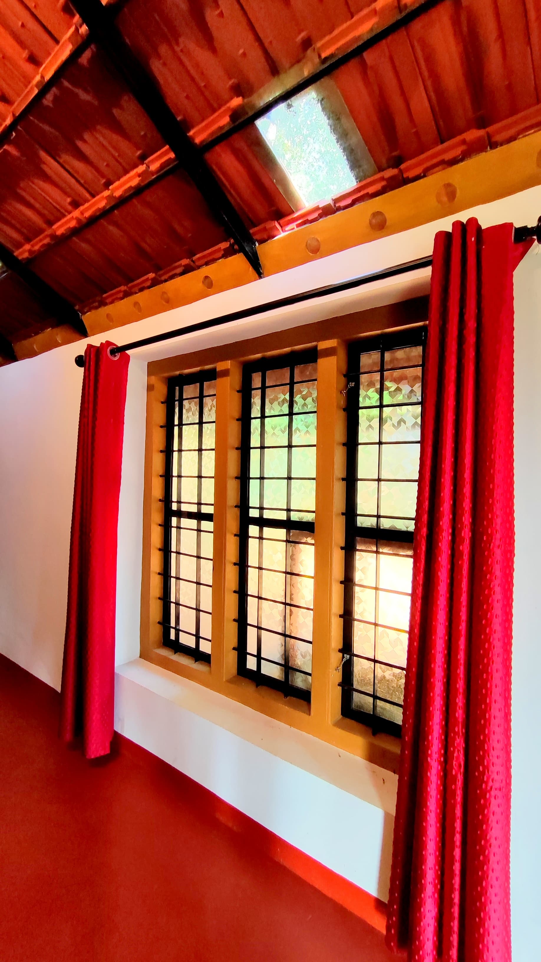 Interior Window with Red Curtains